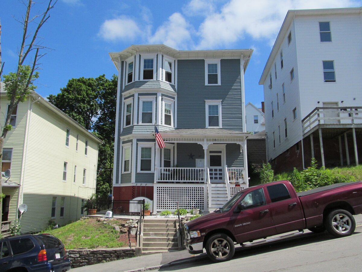 Worcester MA three-decker homes on a bright day — Sell Your House Fast for Cash
