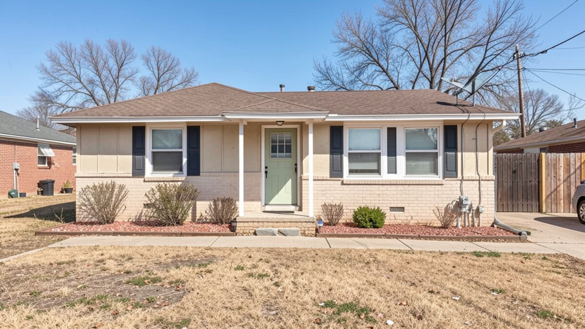 Midland Texas older duplex or small rental property exterior in a modest neighborhood